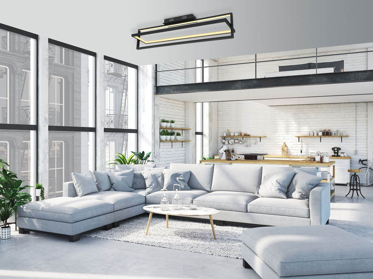 Mise en ambiance du plafonnier noir fixé au plafond dans un salon moderne.