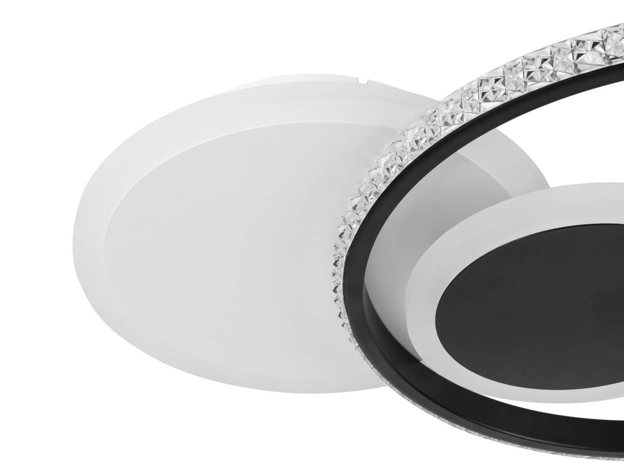 Détail de la finition : bordure cristal de l'anneau et socle blanc mat.