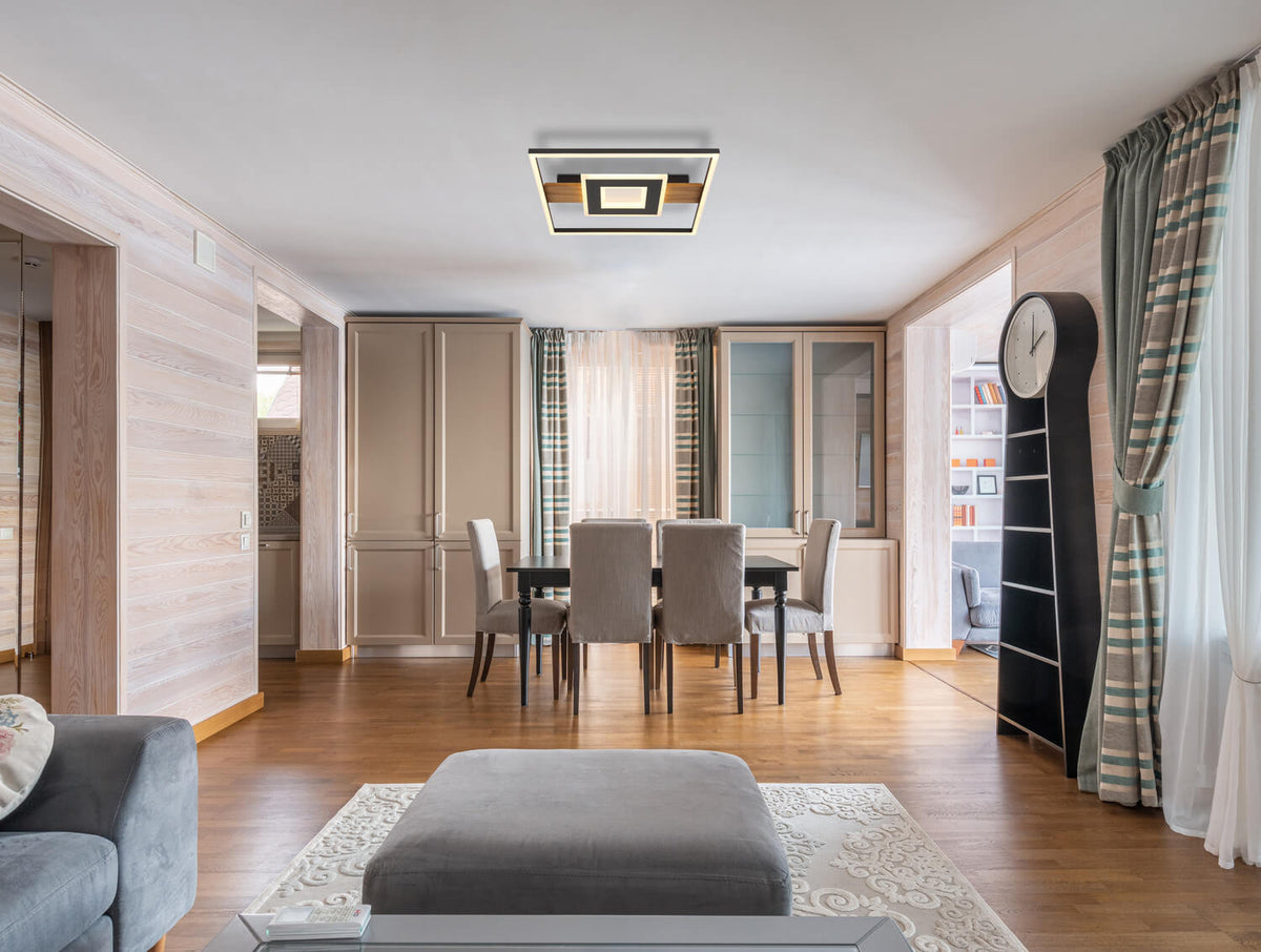 Mise en ambiance du plafonnier fixé au plafond d'un salon-salle à manger moderne