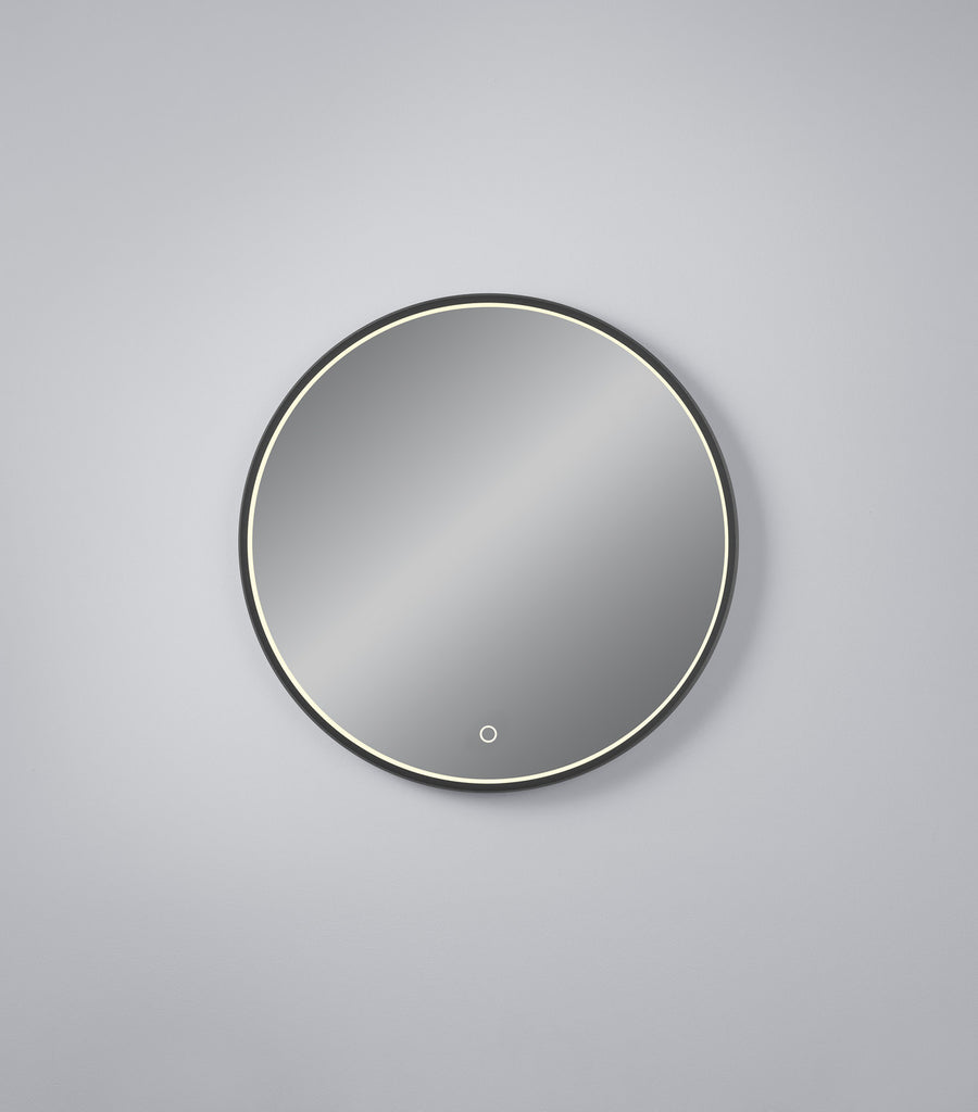 Miroir rond à cadre noir et liseré lumineux, vue de face sur fond gris clair.