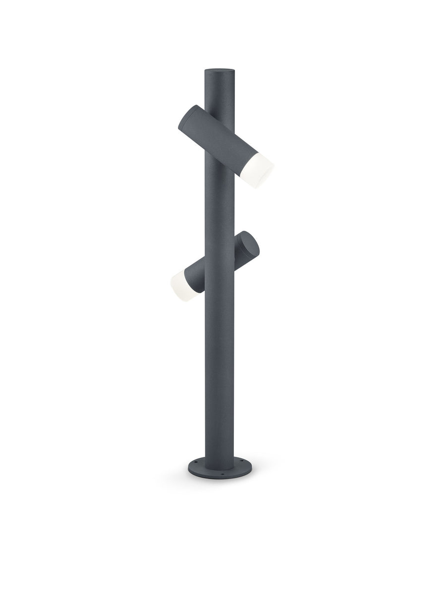 Profil du luminaire sur fond blanc, détail du socle circulaire à fixer au sol