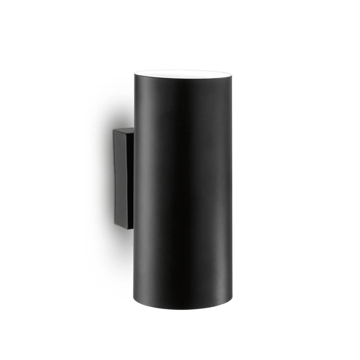 Applique murale cylindrique noire de face, platine de fixation rectangulaire, fond blanc neutre