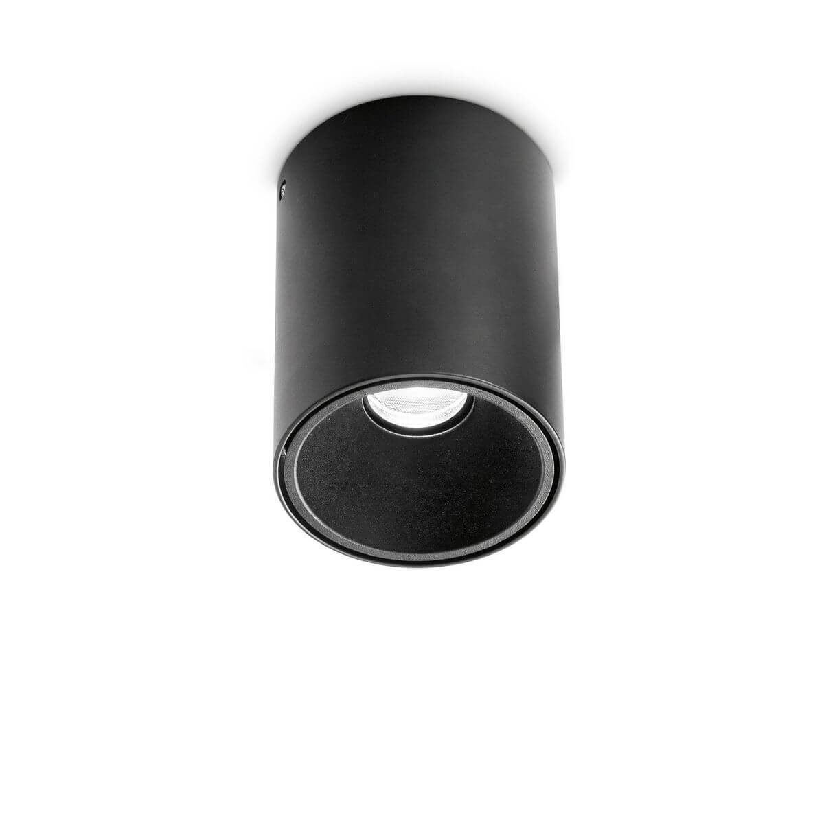 Plafonnier cylindrique noir mat vu de face, source LED allumée visible sous la coupelle