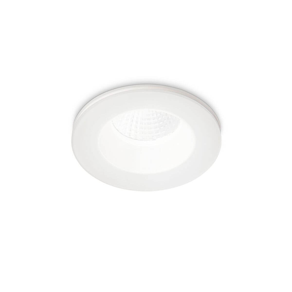 Spot rond blanc encastré vu de face sur fond neutre, collerette fine
