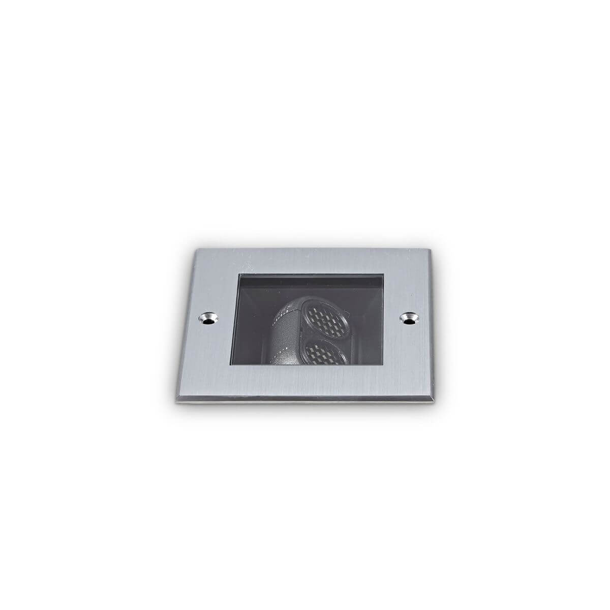 Vue de face du luminaire extérieur encastré avec cadre métallique et vitre de protection.