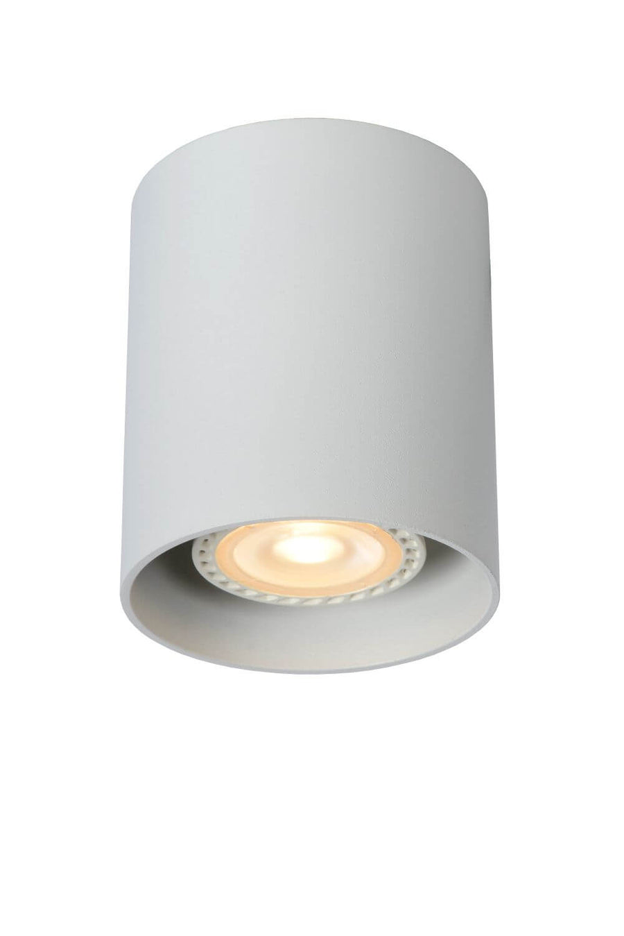 Vue de face du luminaire cylindrique blanc allumé, montrant la source LED chaude en partie basse