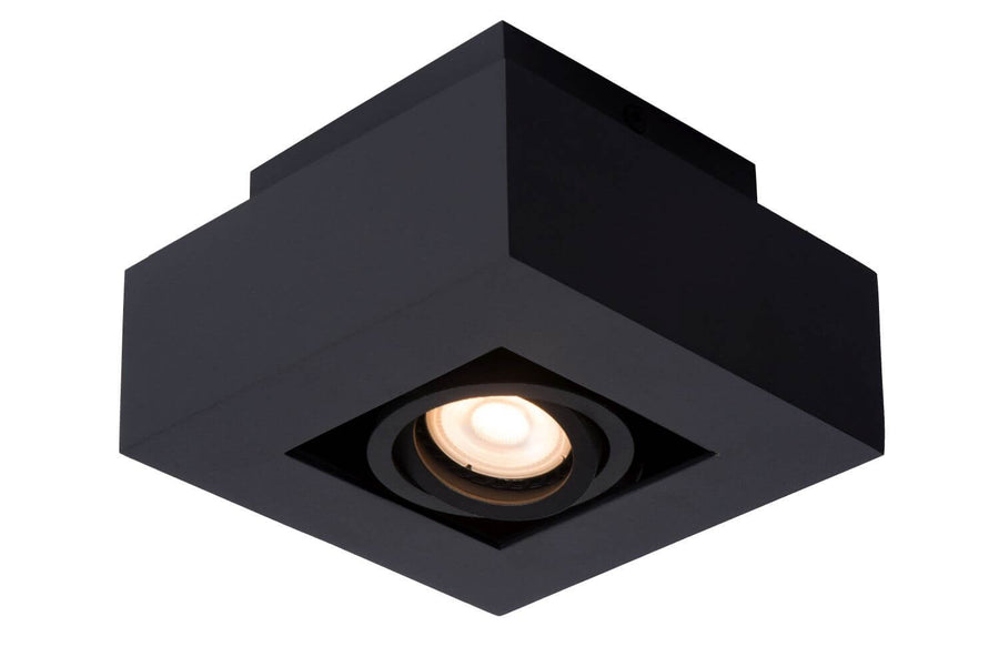Vue de dessous du plafonnier carré noir avec la LED centrale allumée
