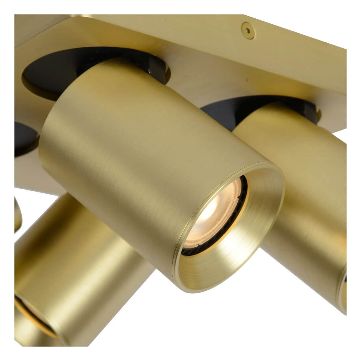 Détail de la finition doré mat et de l'intérieur noir d'un projecteur orientable