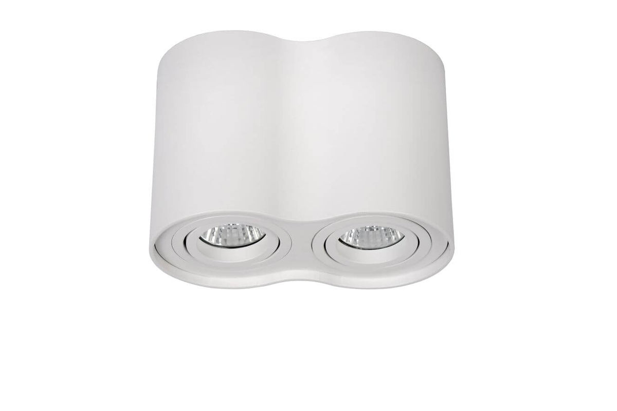 Face avant du luminaire blanc à deux spots, capot cylindrique et réflecteurs visibles.