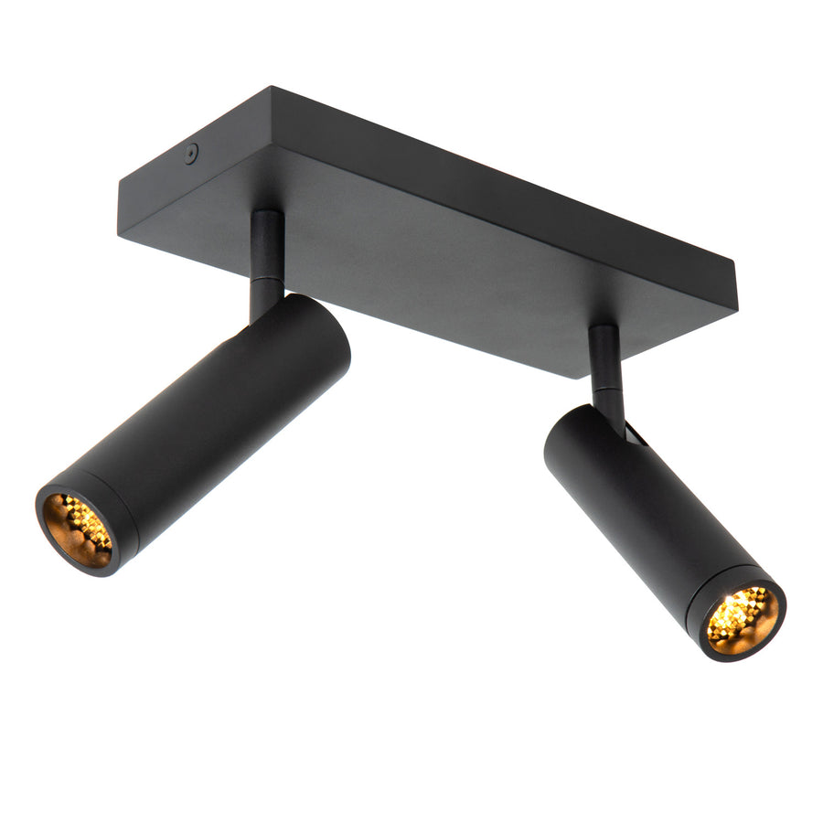 Vue en plongée, boîtier rectangulaire et deux projecteurs cylindriques orientables en métal noir mat