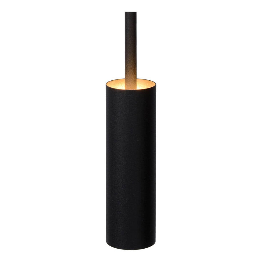 Détail de la sortie de lumière dorée au bas du tube noir.
