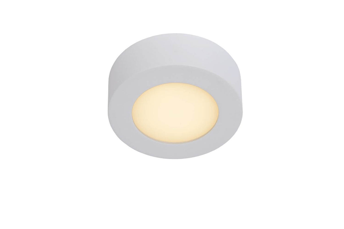 Vue de trois quarts du plafonnier cylindrique blanc, diffuseur jaune pâle