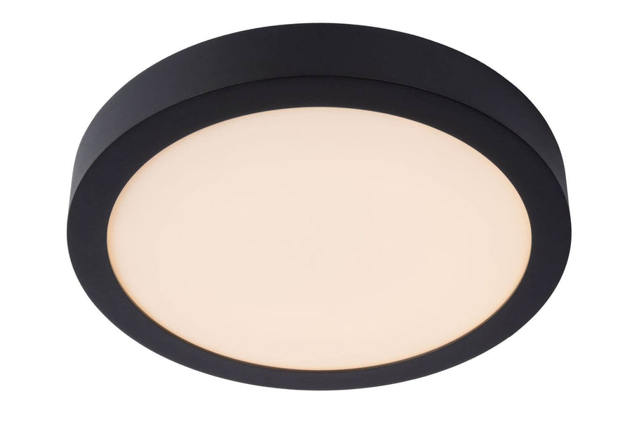 Plafonnier cylindrique noir avec diffuseur opale allumé sur fond blanc