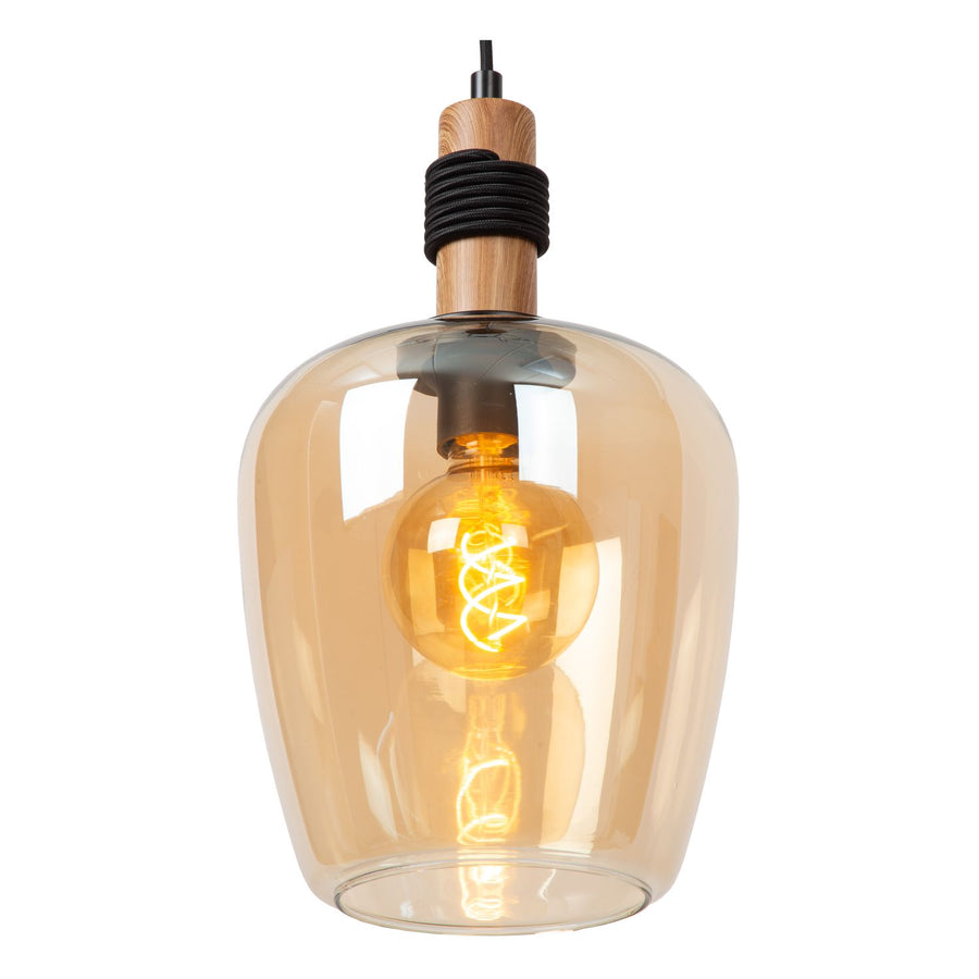 Gros plan sur le bas du luminaire, verre ambré et ampoule à filament allumée.