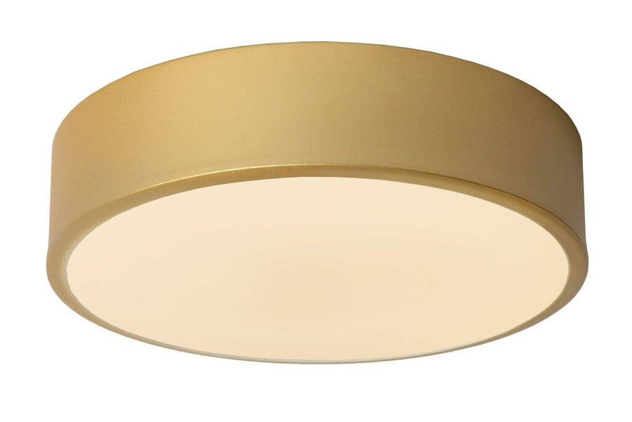 Vue de trois-quarts du luminaire rond montrant l'épaisseur de la bague dorée