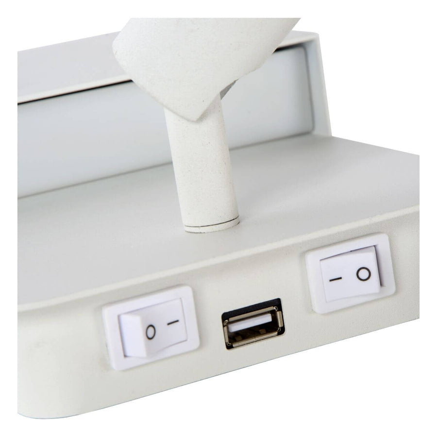 Détail des deux interrupteurs et de la prise USB intégrée à la base.