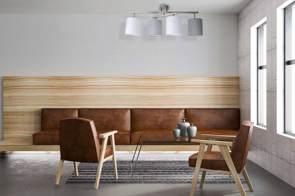 Mise en ambiance du luminaire fixé au plafond au-dessus d'un salon en cuir brun