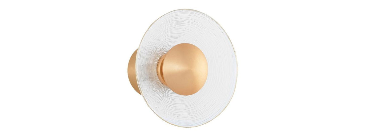 Vue de face du luminaire rond en verre strié et centre doré