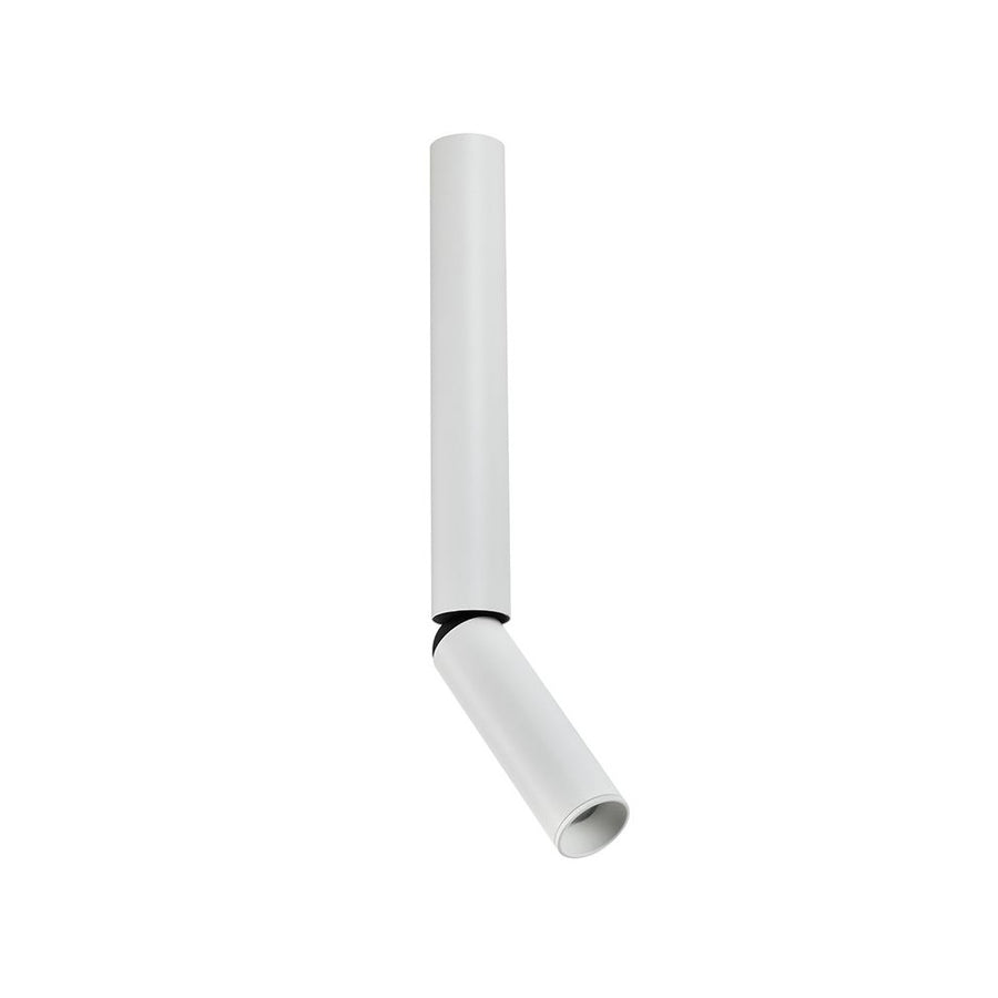 Luminaire blanc de face, tube vertical et tête inclinée vers le bas.