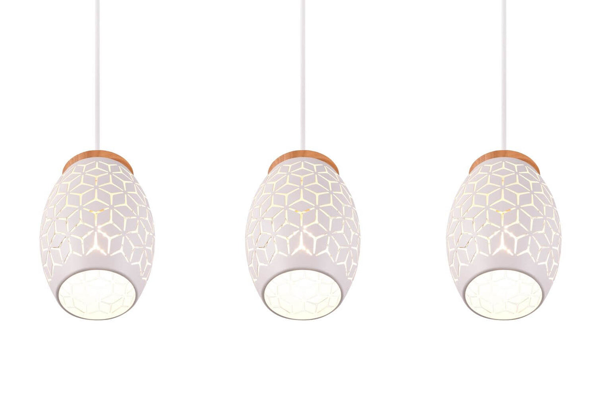Gros plan du dessous des abat-jours allumés, motif hexagonal et lumière chaude