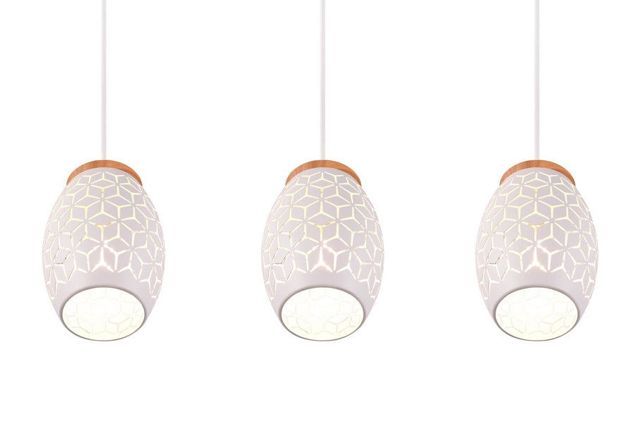 Gros plan du dessous des abat-jours allumés, motif hexagonal et lumière chaude