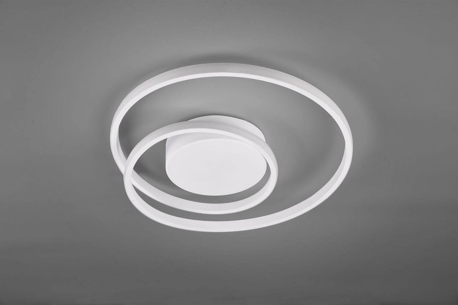 Luminaire éteint vu de dessous, forme ronde des anneaux et finition blanche mate