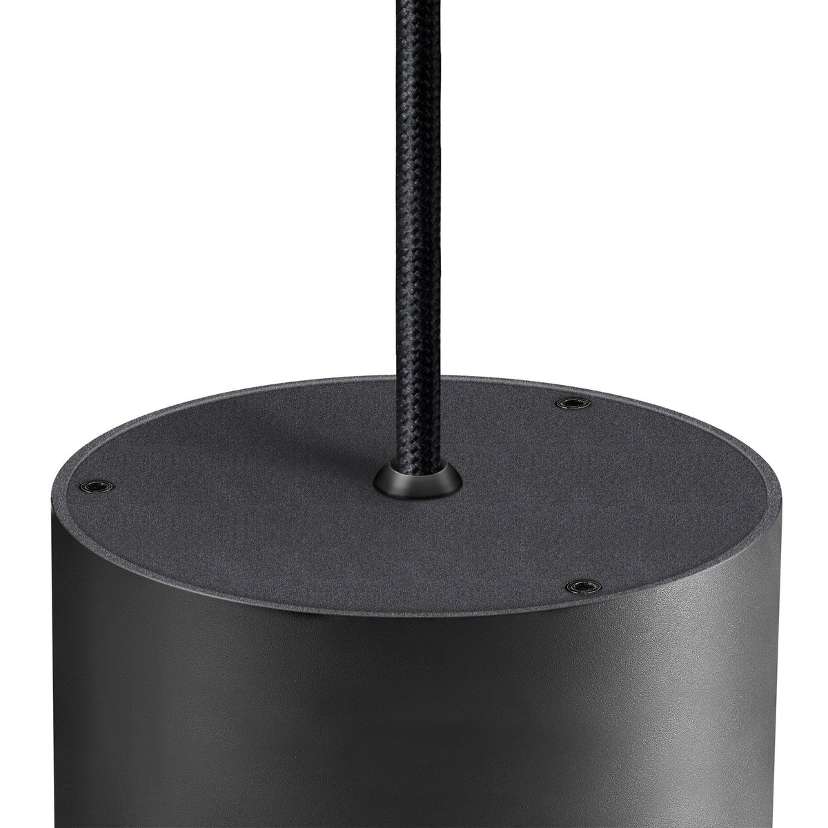 Détail du dessus du cylindre noir, câble tressé et vis de fixation apparentes.