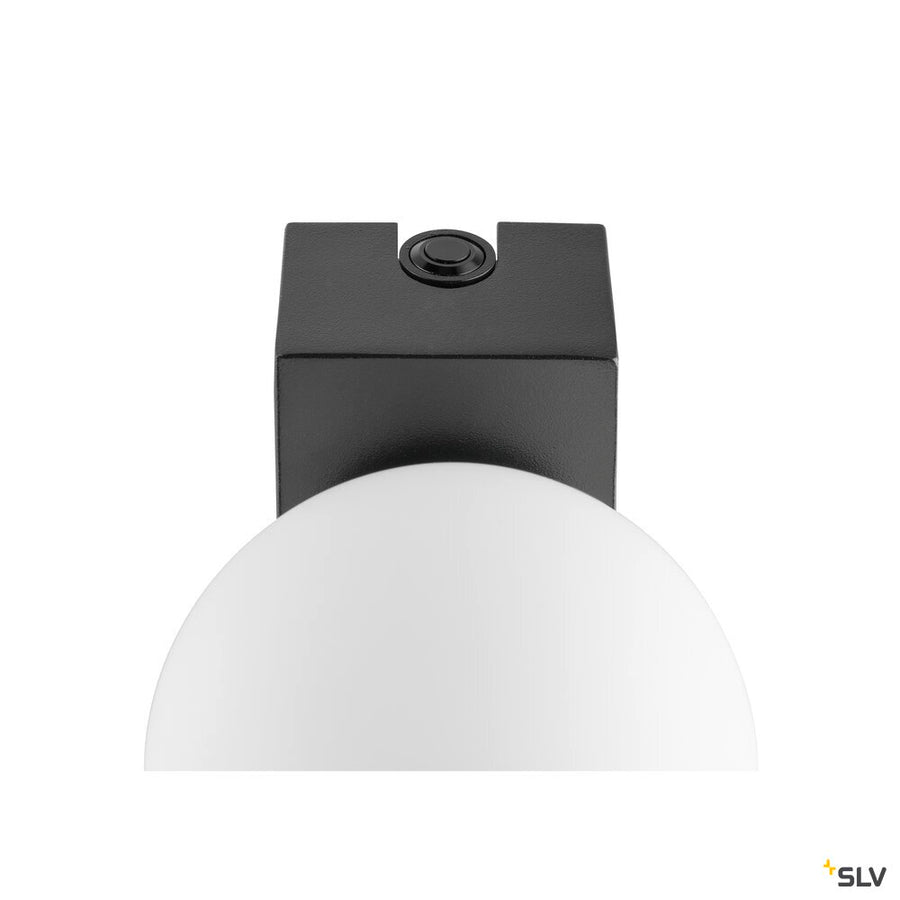 Vue de dessus du support noir et d'un globe avec bouton circulaire