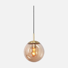 Brass globe pendant light, amber glass for entryway and kitchen | Bollique