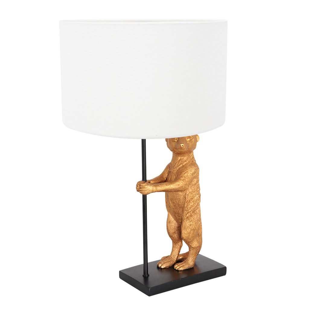 Vue de face d'une lampe à abat-jour blanc et suricate doré