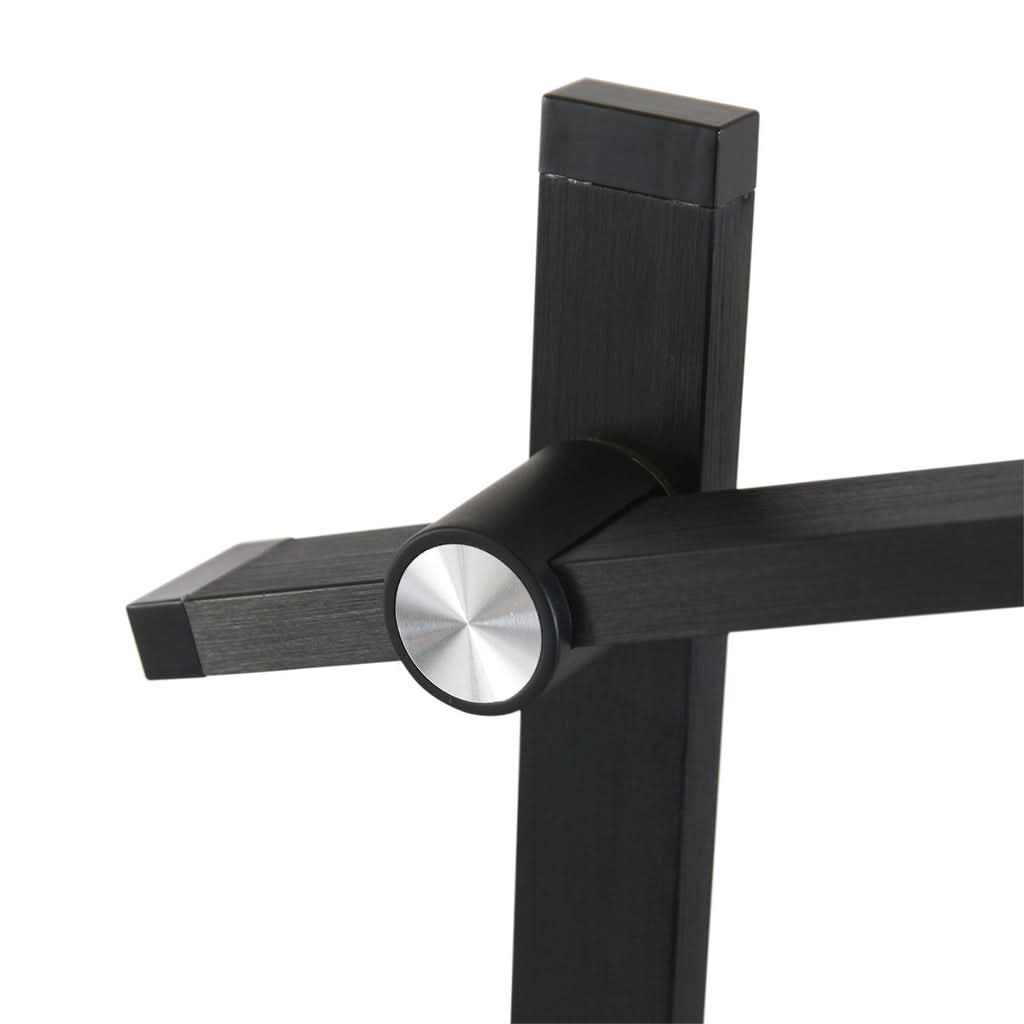 Détail de l'articulation centrale avec pivot argent et bras croisés