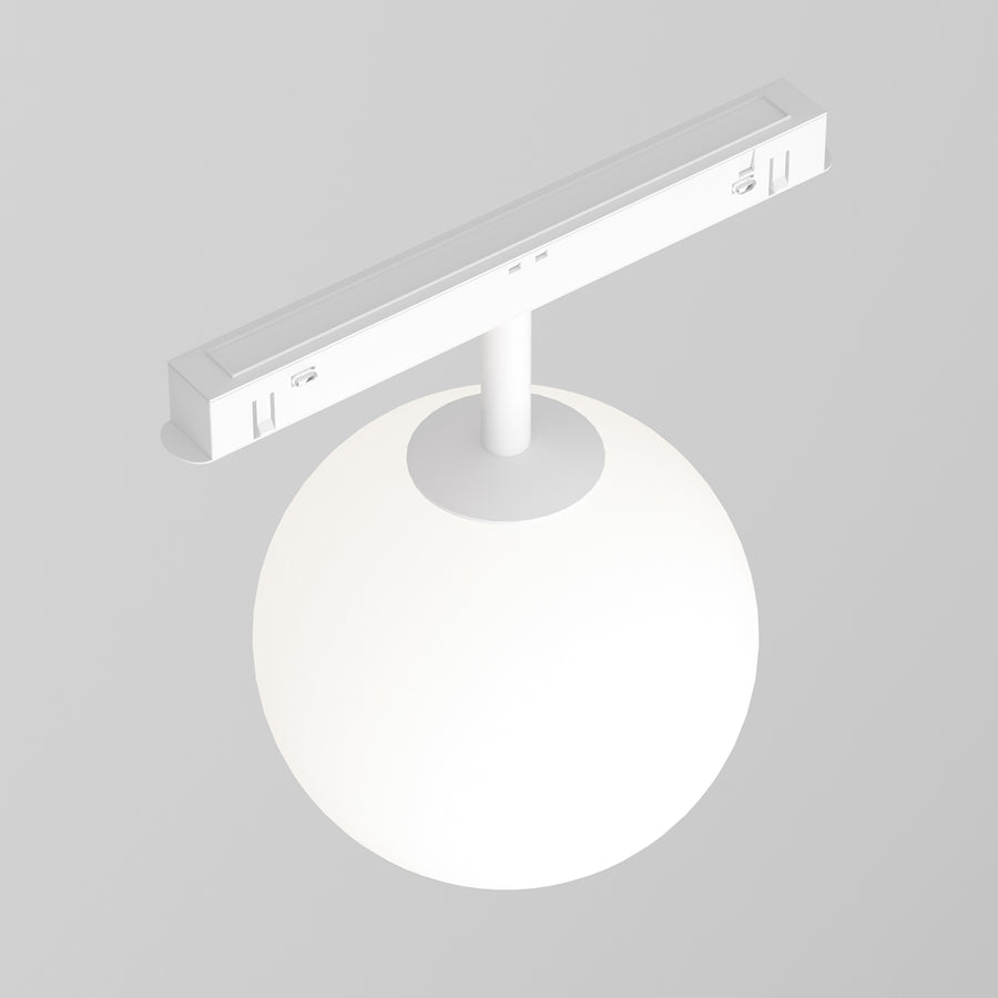 Vue de trois quarts du rail blanc et de la sphère lumineuse blanche suspendue.
