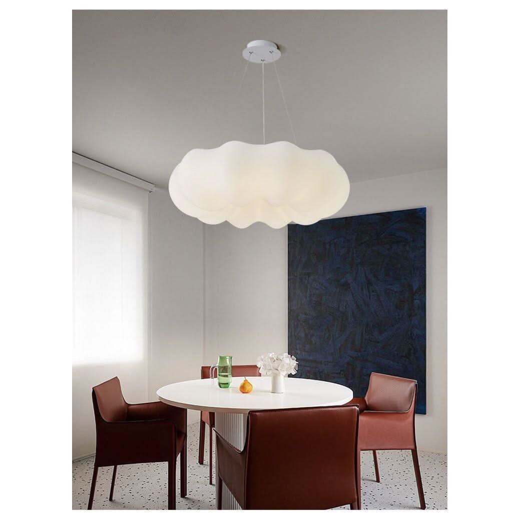 Mise en ambiance du luminaire nuage eclaire une table ronde de salle a manger