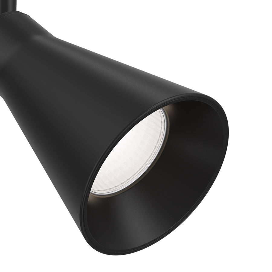 Gros plan de l'embouchure noire et du diffuseur blanc cerclé, finition mate
