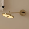 Applique murale LED Asteria Long HW en aluminium, laiton poli, Ø 15 cm