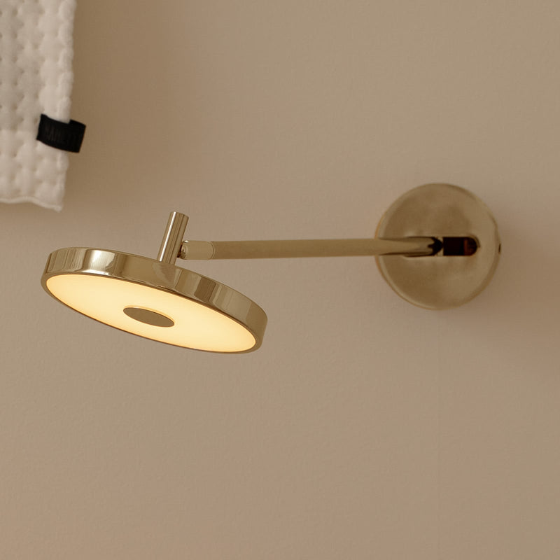 Applique murale LED Asteria Long HW en aluminium, laiton poli, Ø 15 cm