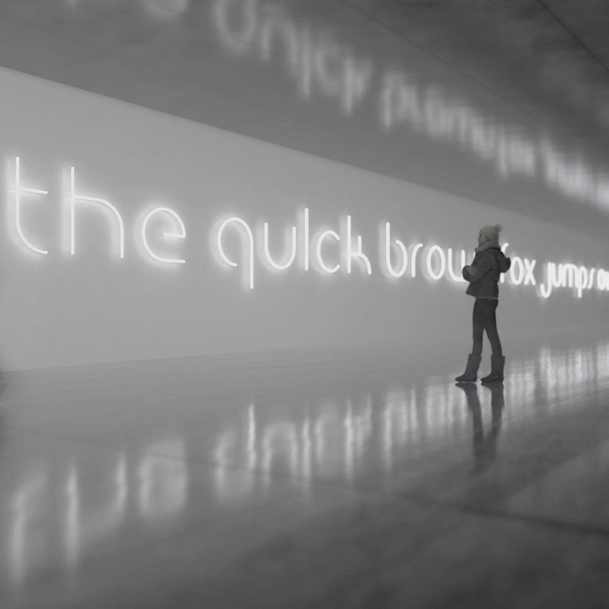 Vue d'ambiance grand format avec phrase lumineuse et reflet sur le sol brillant