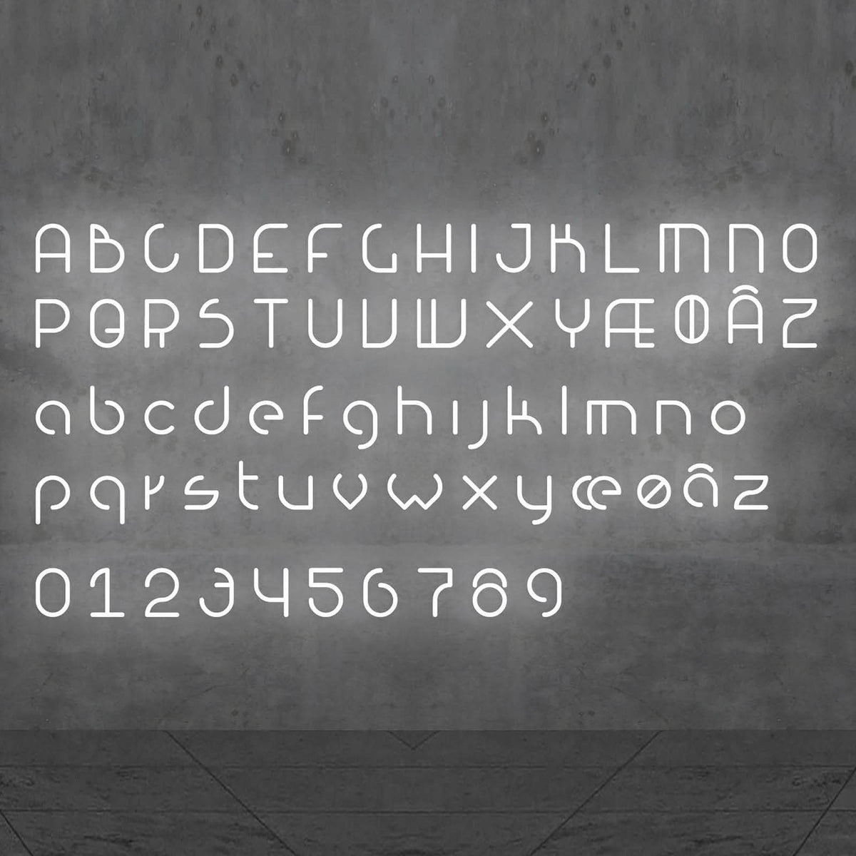 Planche complète des lettres et chiffres LED blancs disponibles, présentés sur fond gris.