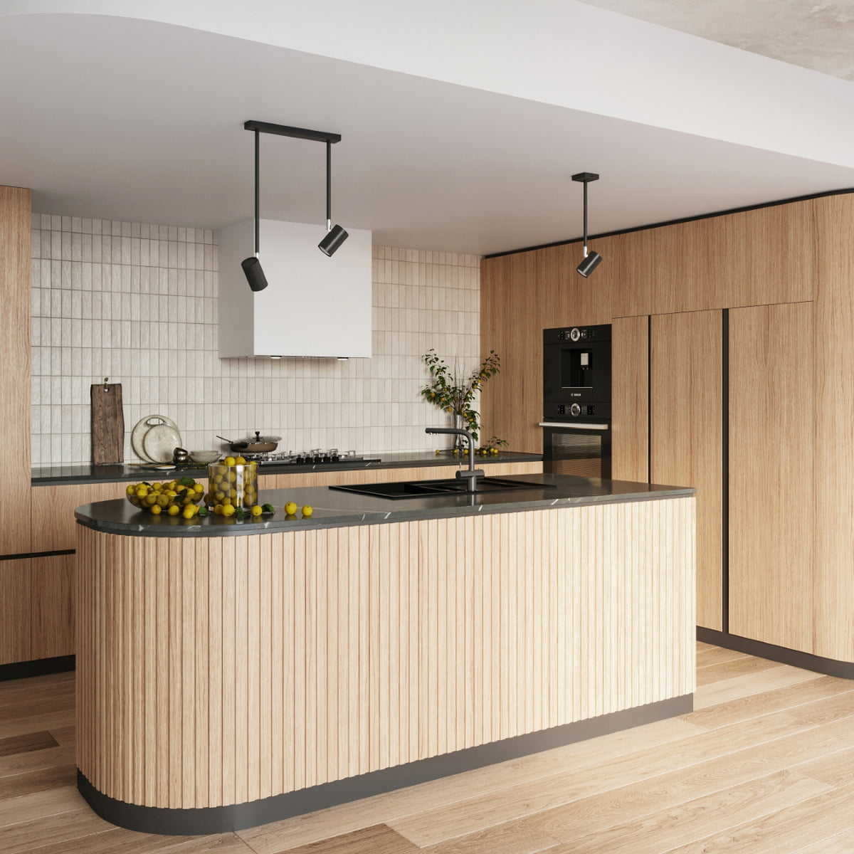 Mise en ambiance dans une cuisine moderne avec des plafonniers noirs orientables.