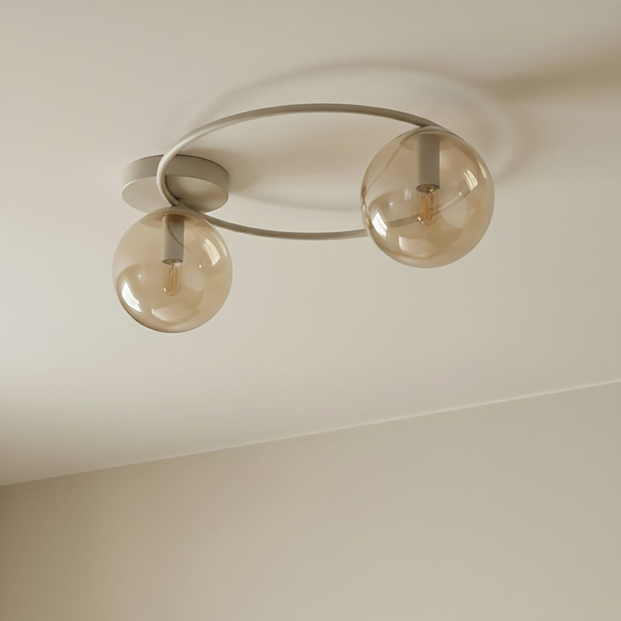 Photo produit du plafonnier fixé au plafond, montrant douilles et tiges métalliques