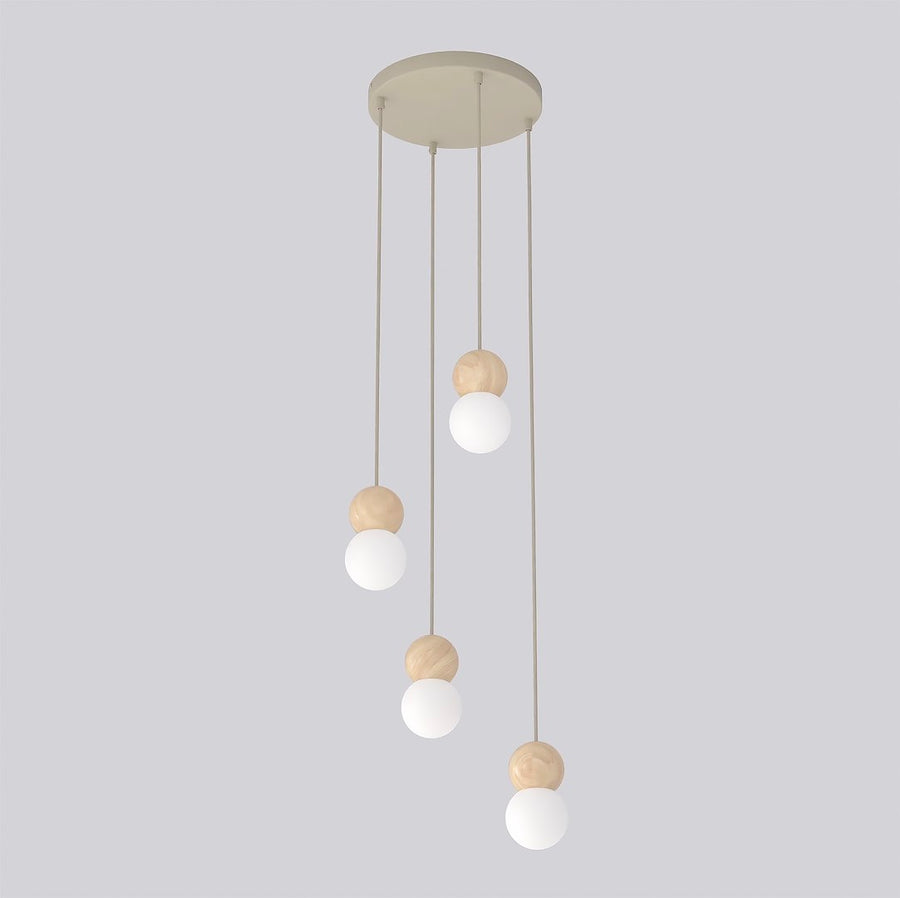 Vue d'ensemble du luminaire, rosace ronde beige et quatre câbles décalés