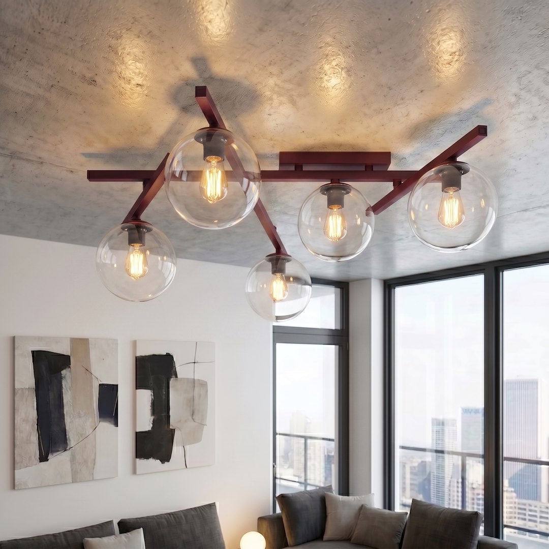 Mise en ambiance du luminaire sous un plafond béton dans un salon moderne