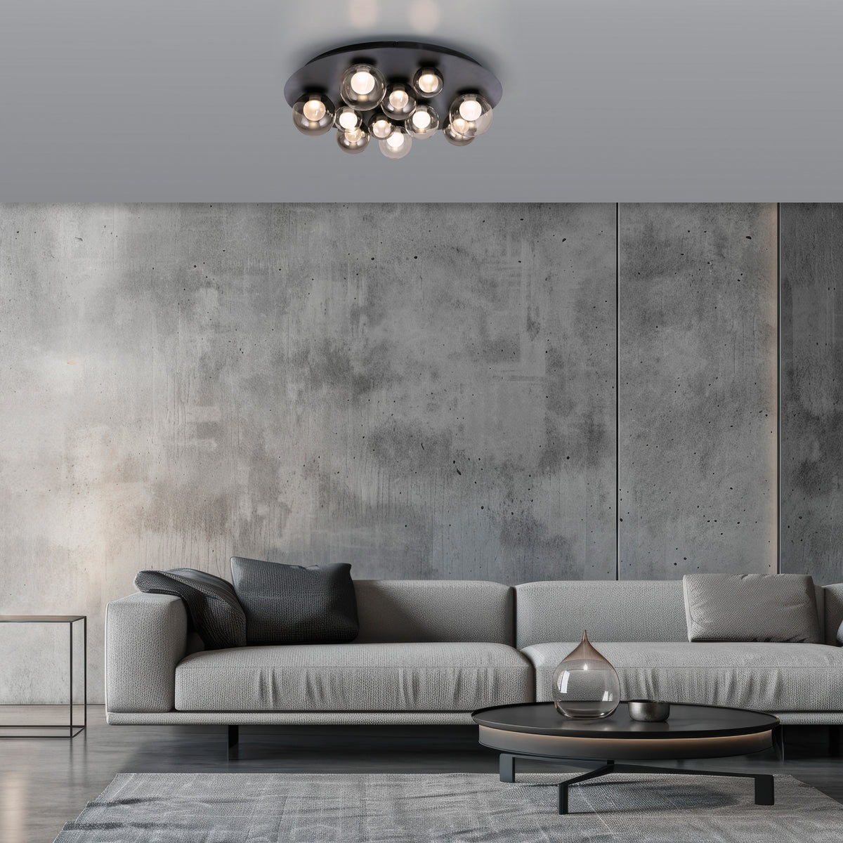 Mise en ambiance dans un salon en béton gris avec canapé et table basse