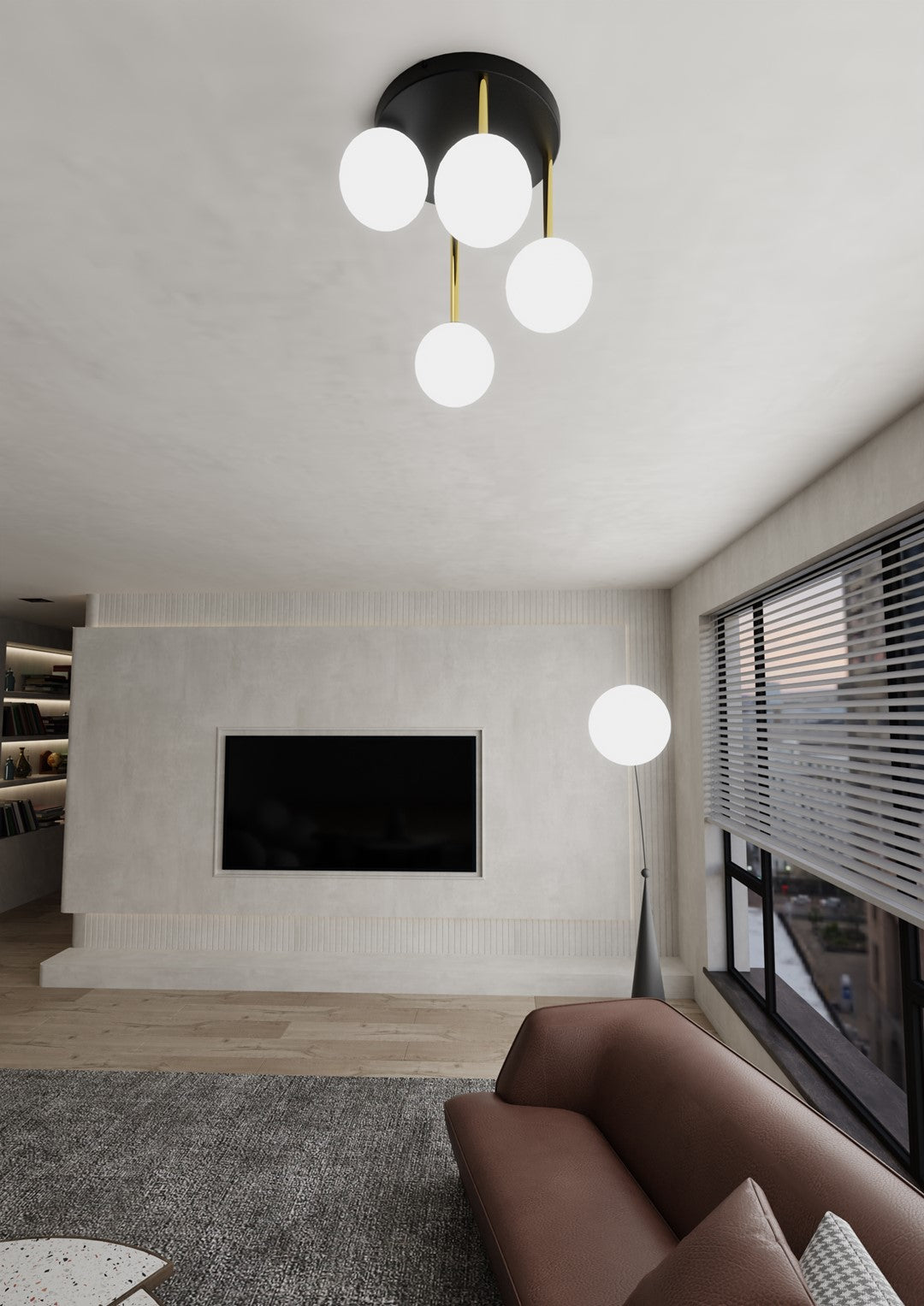 Mise en ambiance d'un salon contemporain, plafonnier allumé au-dessus du canapé en cuir