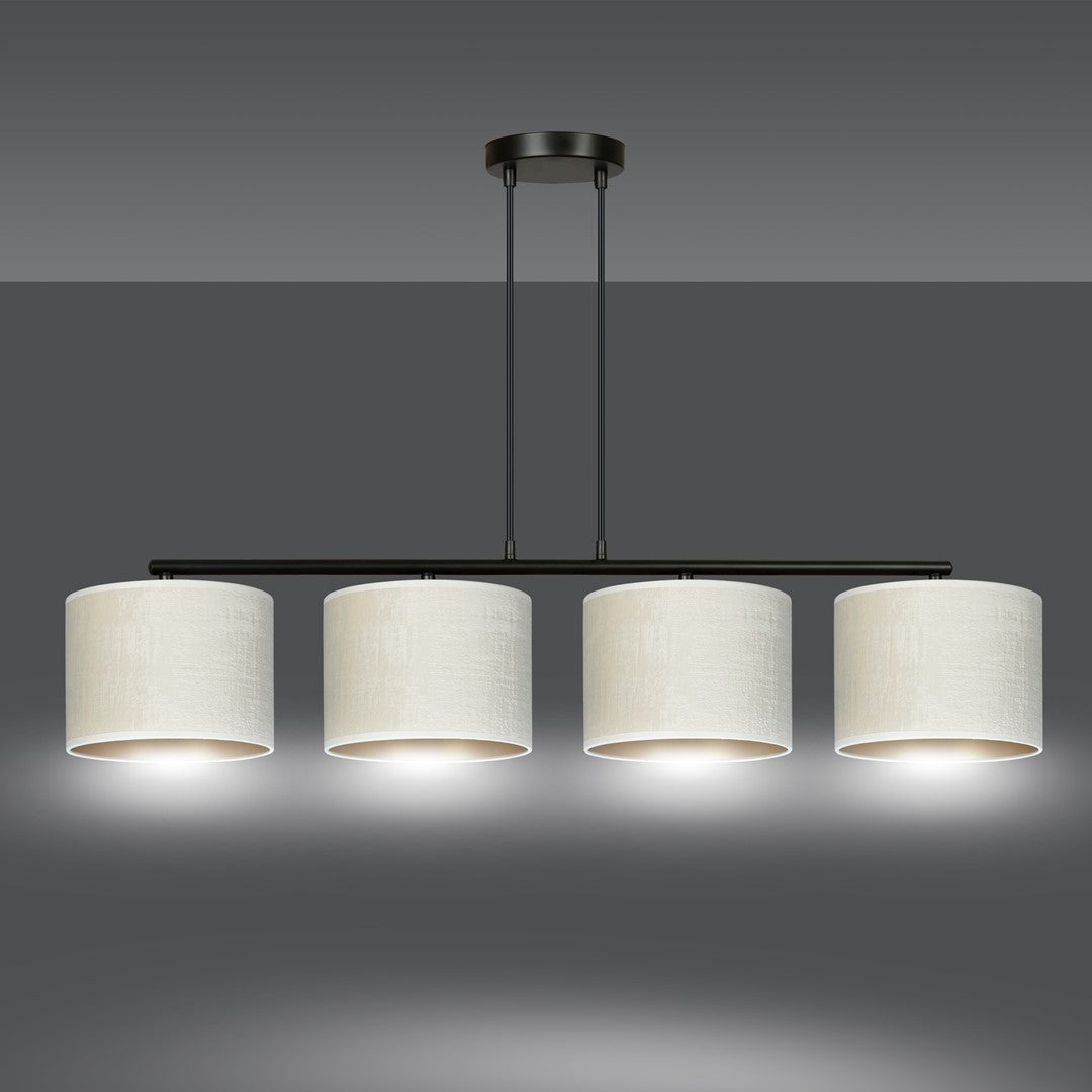 Le luminaire allumé sur fond gris, halo lumineux sous chaque abat-jour.