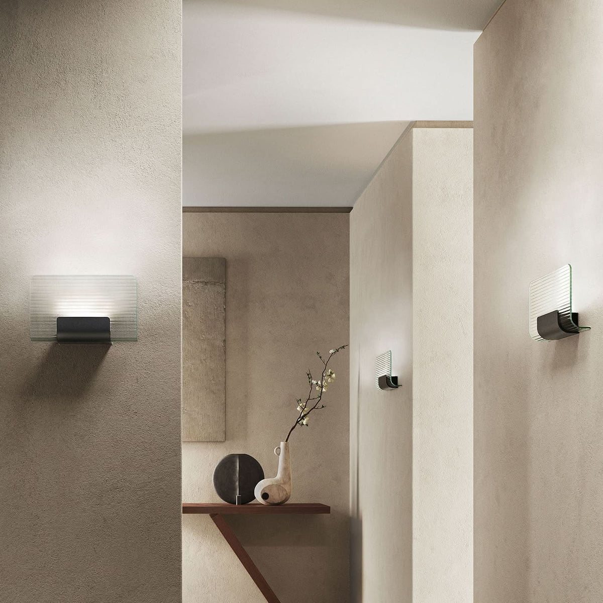 Applique murale LED Nami en verre, transparent et noir, hauteur 18 cm