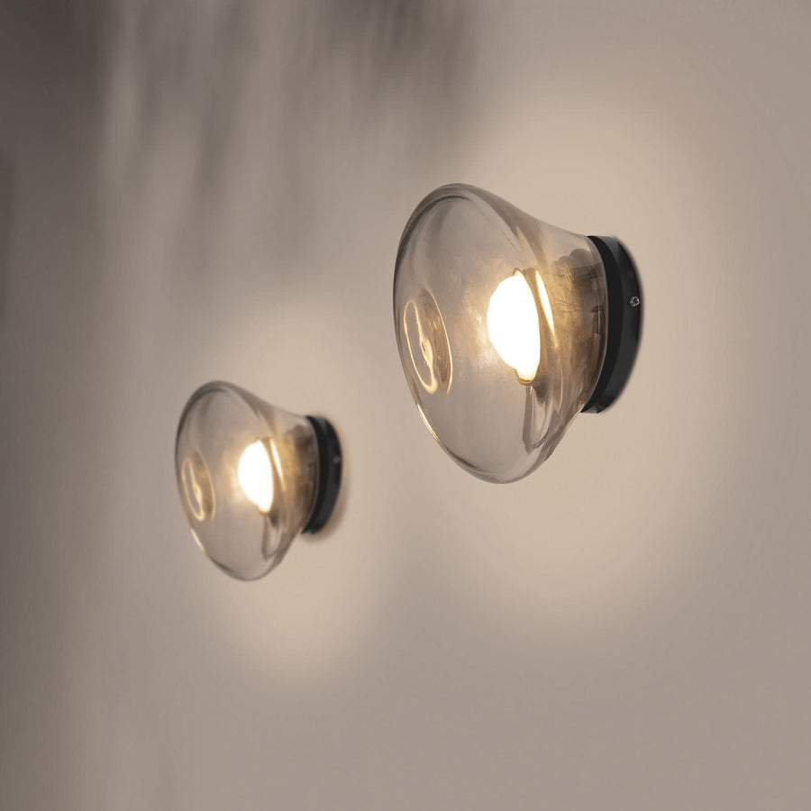Applique murale LED Agua en verre, noir et transparent, Ø 13 cm, IP44, 3000 K, 3,2 W