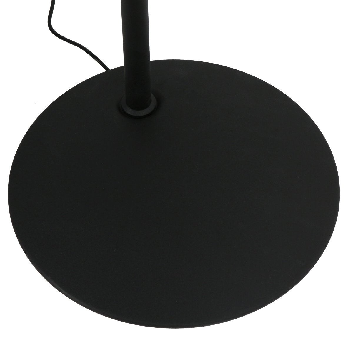 Détail de la base ronde noire et du câble d'alimentation sortant