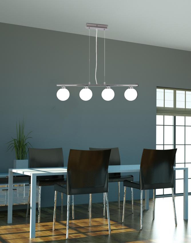 Mise en ambiance au-dessus d'une table à manger, suspension allumée dans un intérieur contemporain.