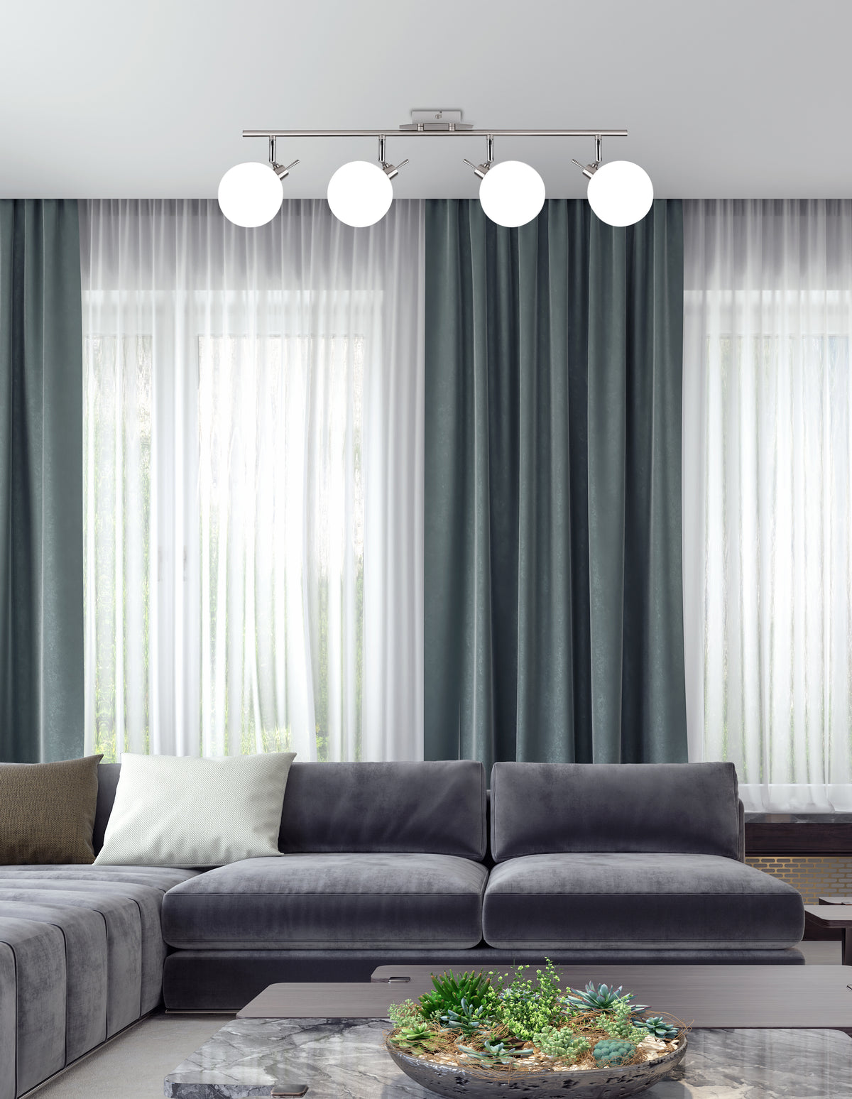 Mise en ambiance du plafonnier allumé au-dessus d'un salon avec canapé gris
